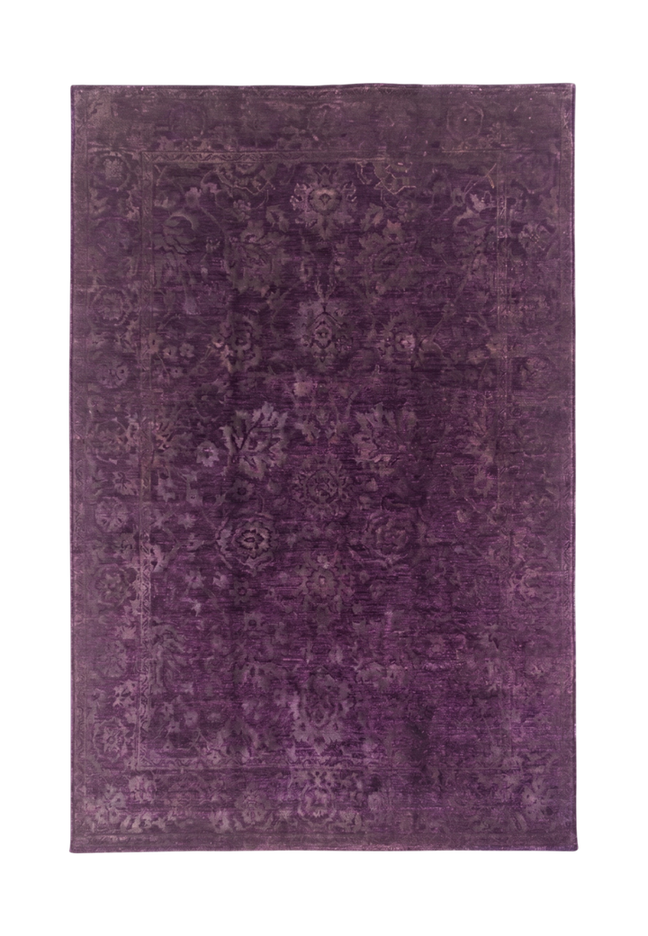 Purple floral patterned rug on a white background
