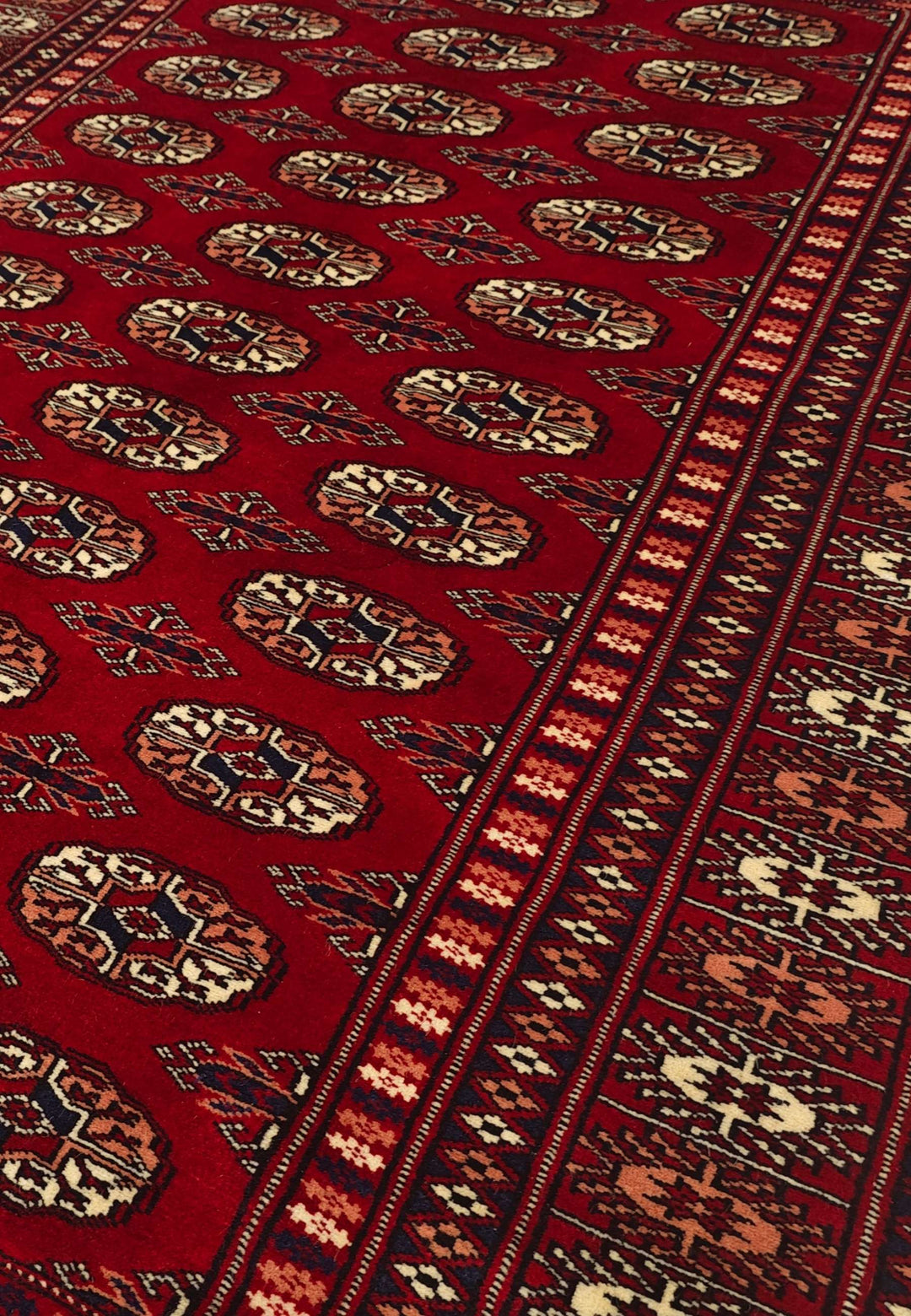 Deep Red Turkmen Gül Bokhara Rug, Hand-Knotted Wool