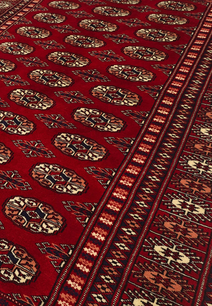 Deep Red Turkmen Gül Bokhara Rug, Hand-Knotted Wool