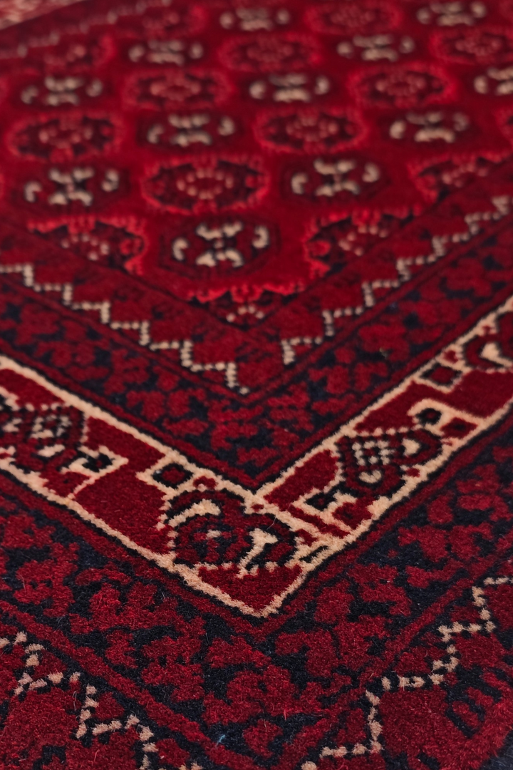 Deep Red Turkmen Gül Khan Muhammadi Rug, Hand-Knotted Wool