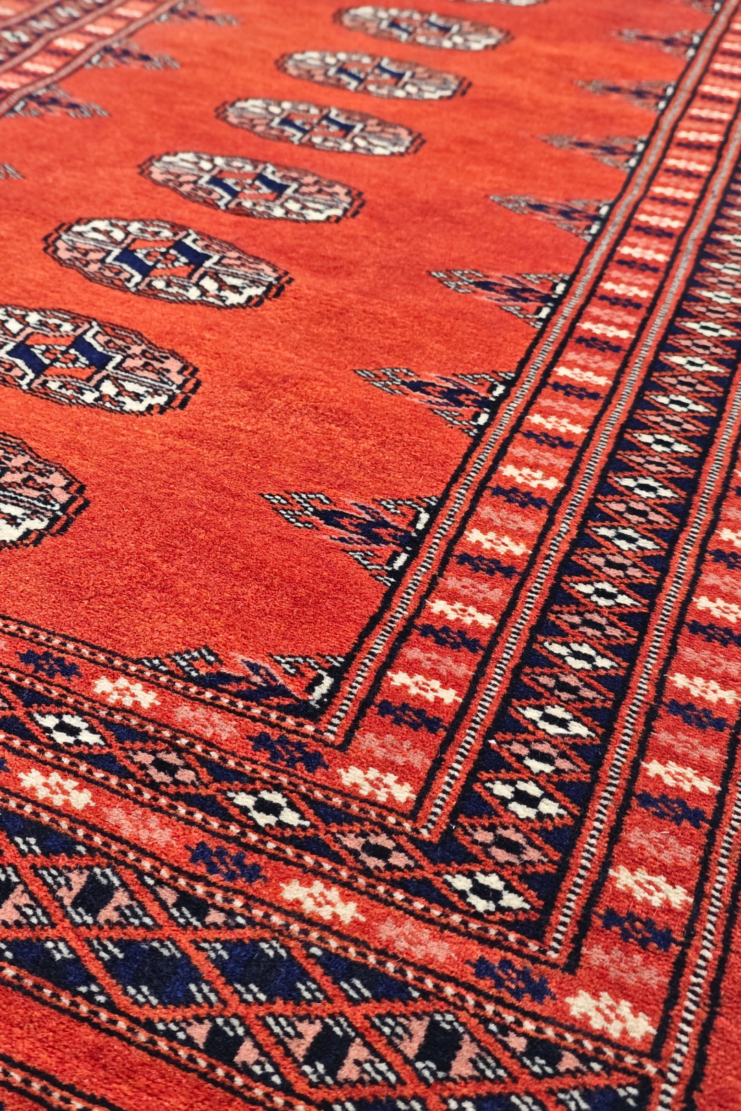 Coral Red and Indigo Turkmen Gül Bokhara, Hand-Knotted Wool Rug