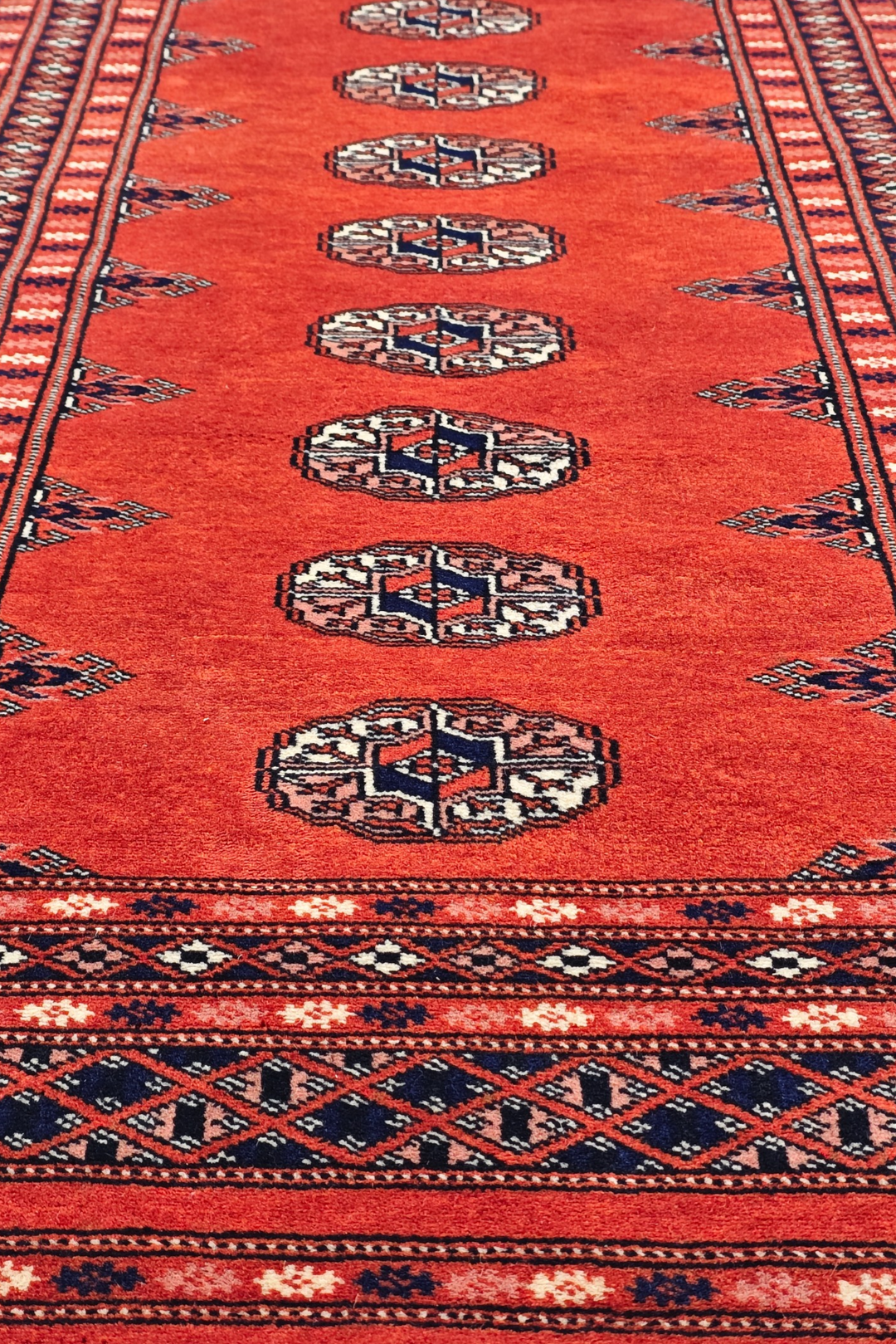 Coral Red and Indigo Turkmen Gül Bokhara, Hand-Knotted Wool Rug