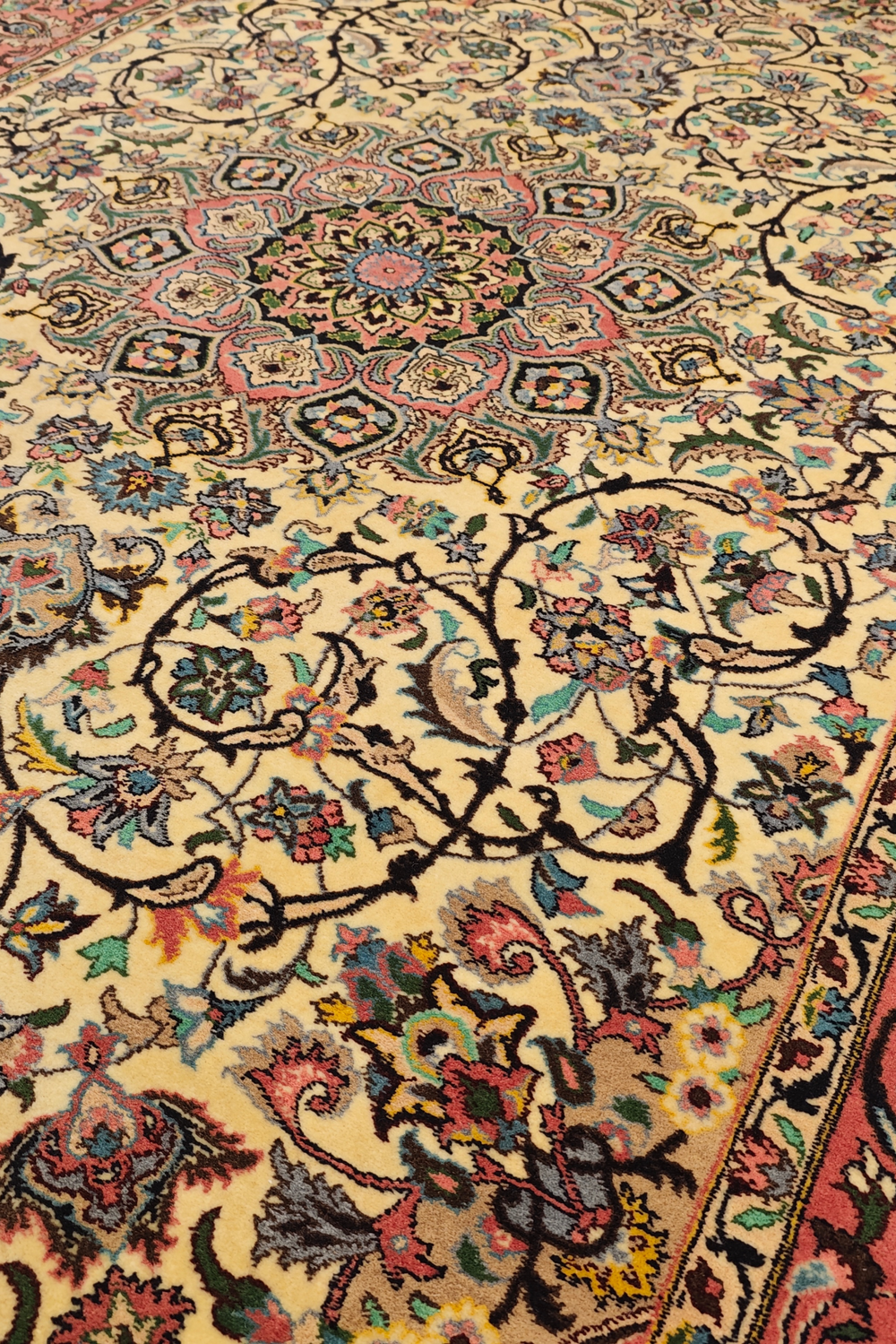 Close-up of a intricately designed rug with floral patterns