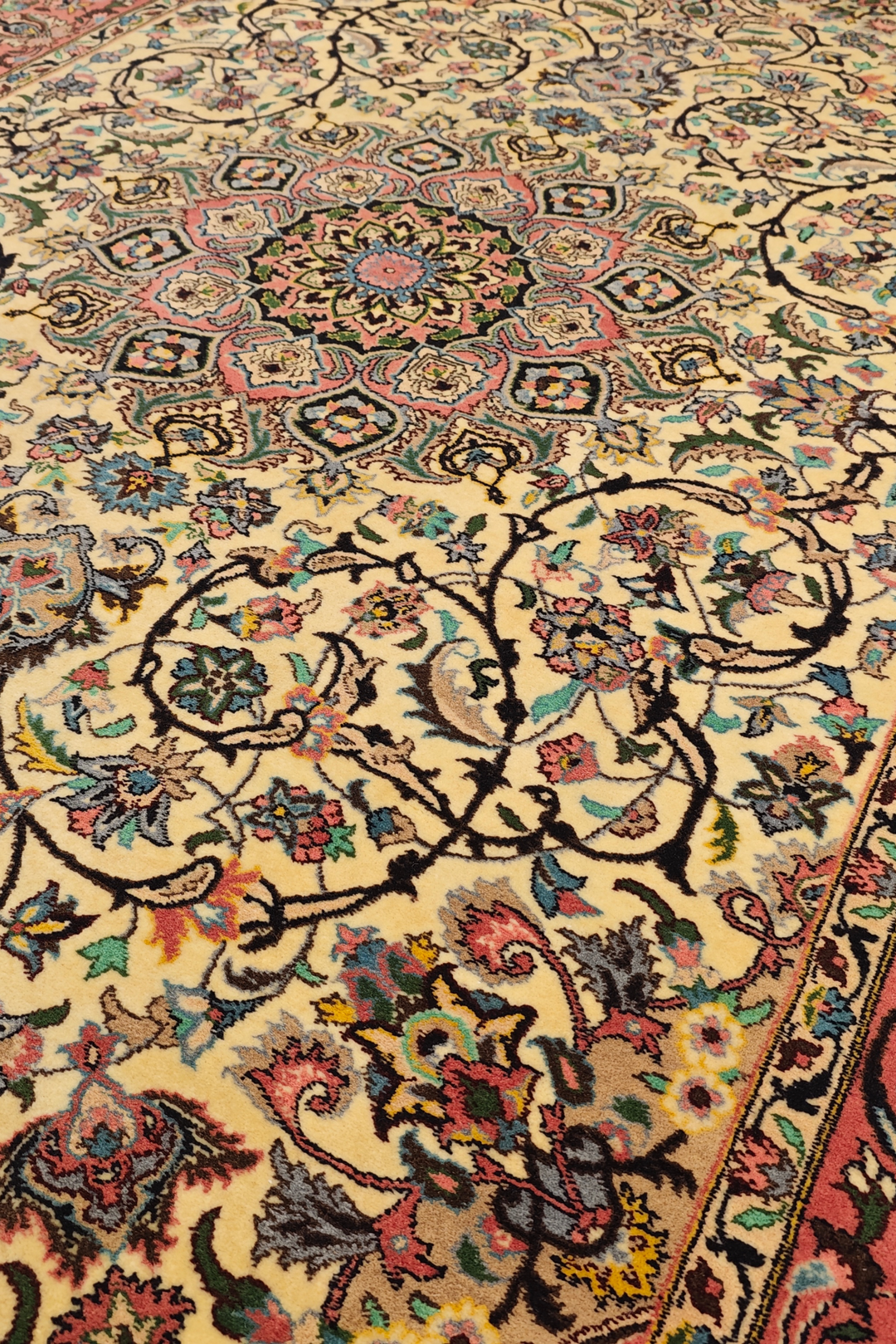 Close-up of a intricately designed rug with floral patterns