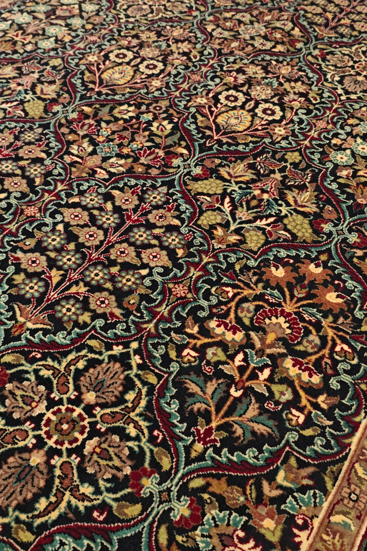 Close-up of a patterned rug with intricate designs.