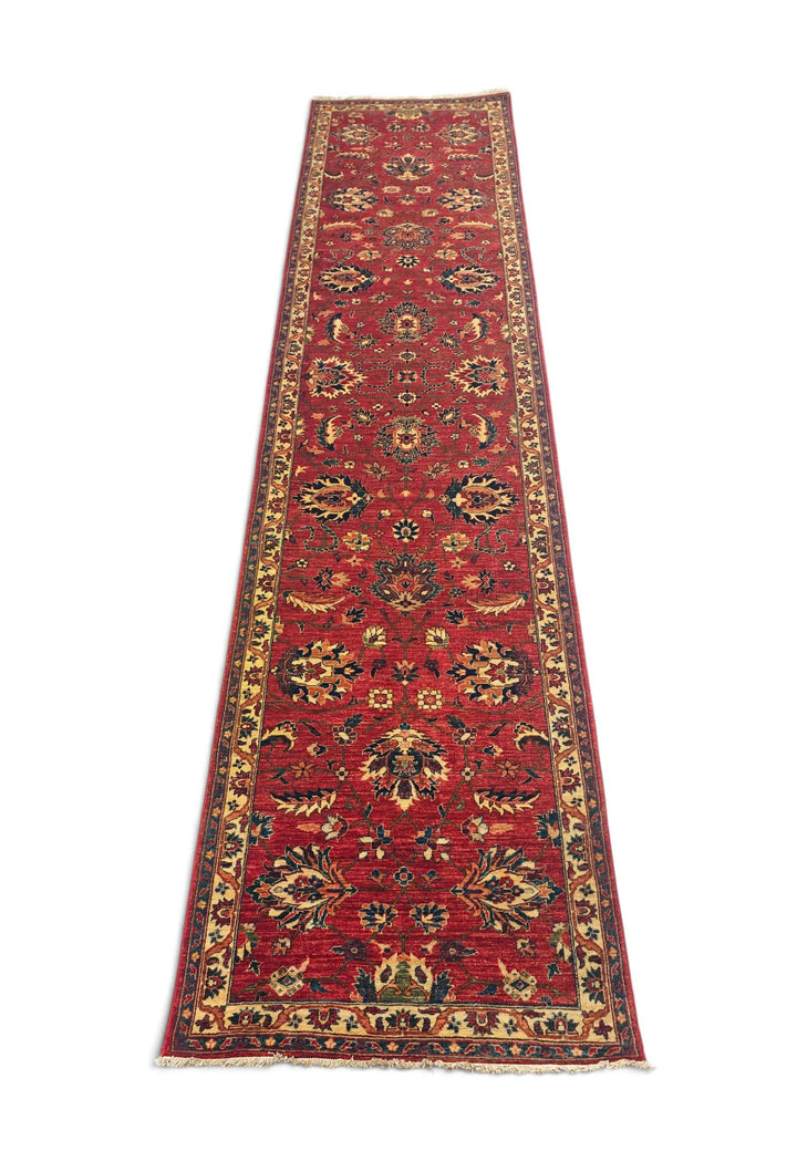Border detail of red gold Qadeem Chobi runner