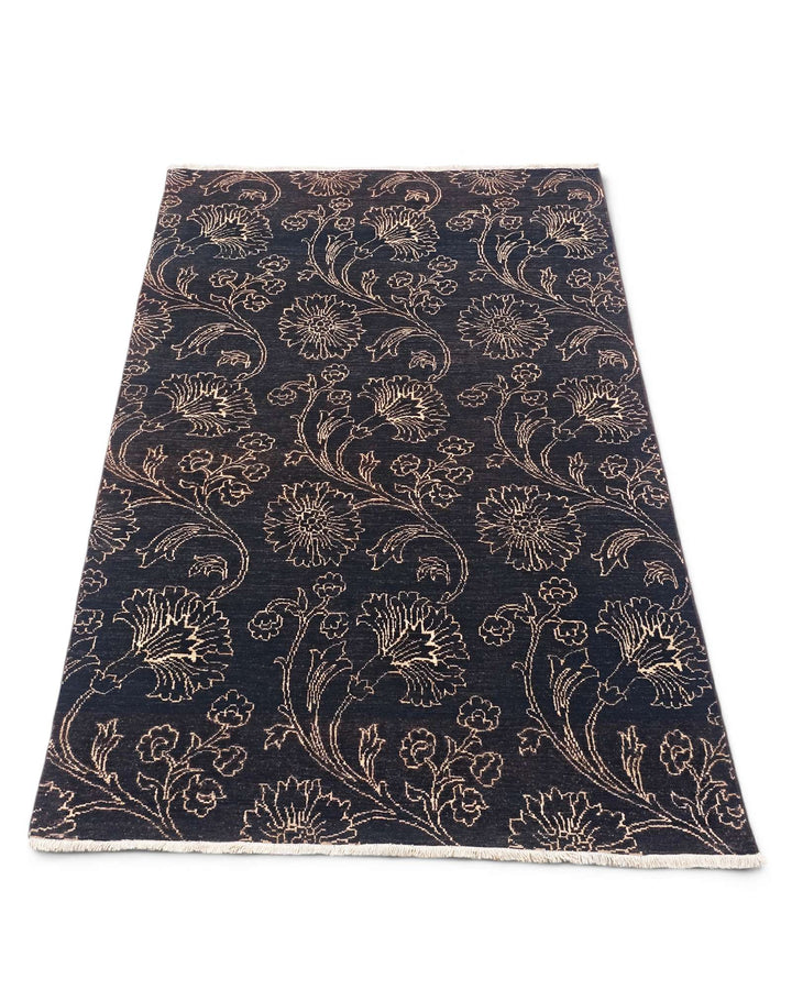 Hand-knotted wool pile of midnight floral Gabbeh rug