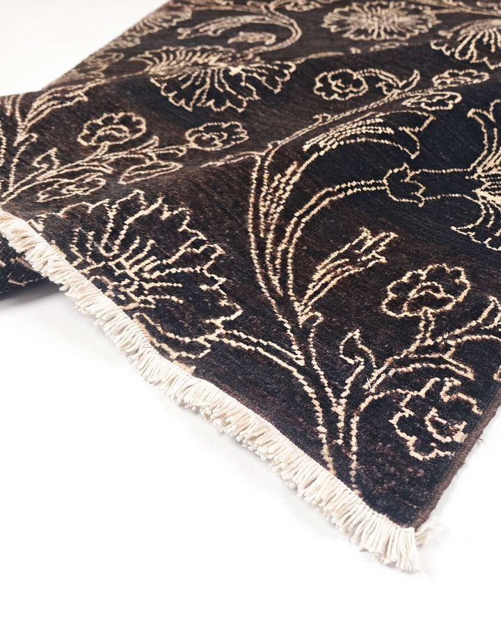 Hand-knotted Afghan Gabbeh rug with midnight floral field