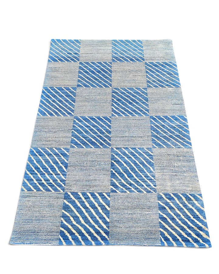 Hand-knotted wool pile of blue check Gabbeh rug