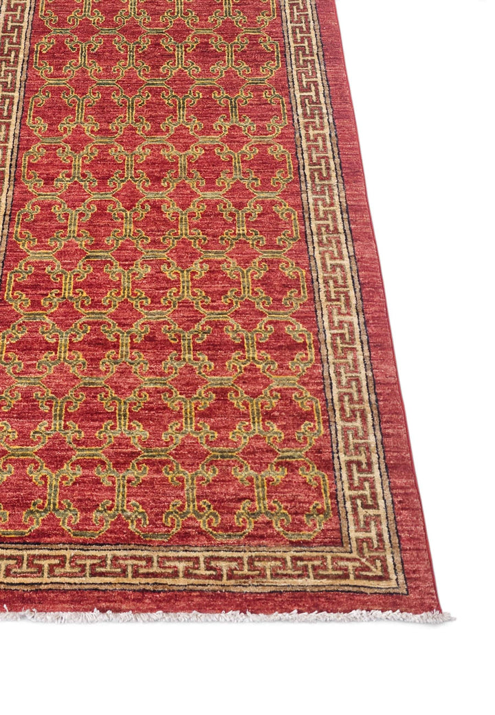 Corner of brick red and camel meander Afghan hand-knotted runner
