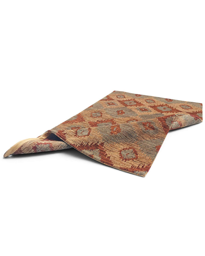 Corner of sienna ikat Afghan Gabbeh wool rug