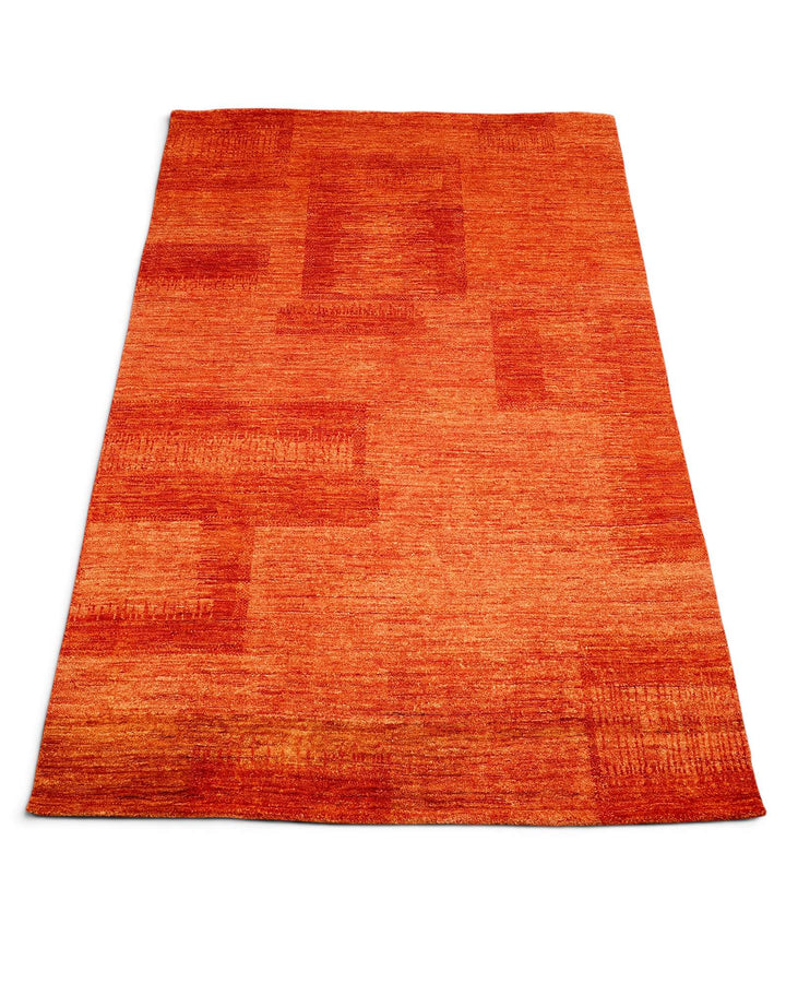 Border detail of terracotta hand-knotted Afghan Gabbeh rug