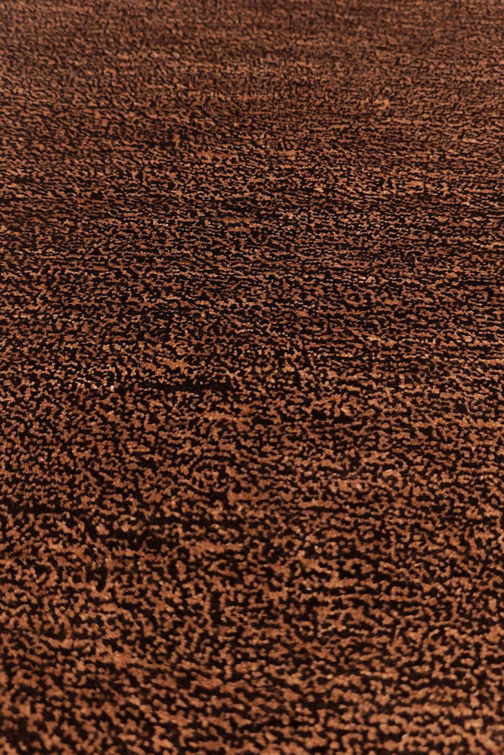 Border detail of chestnut brown hand-knotted Afghan Gabbeh rug
