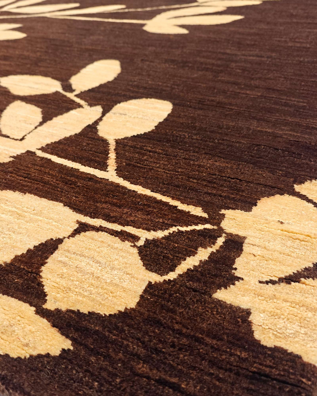 One-of-a-kind chocolate brown leaf Afghan Gabbeh rug