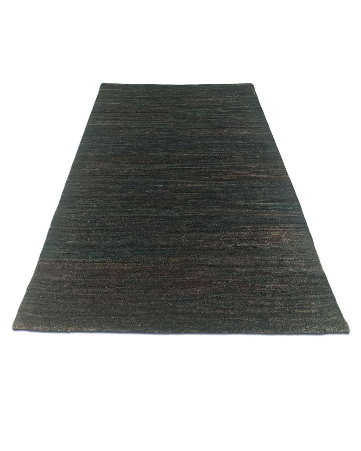 Hand-knotted wool pile of forest green Gabbeh rug