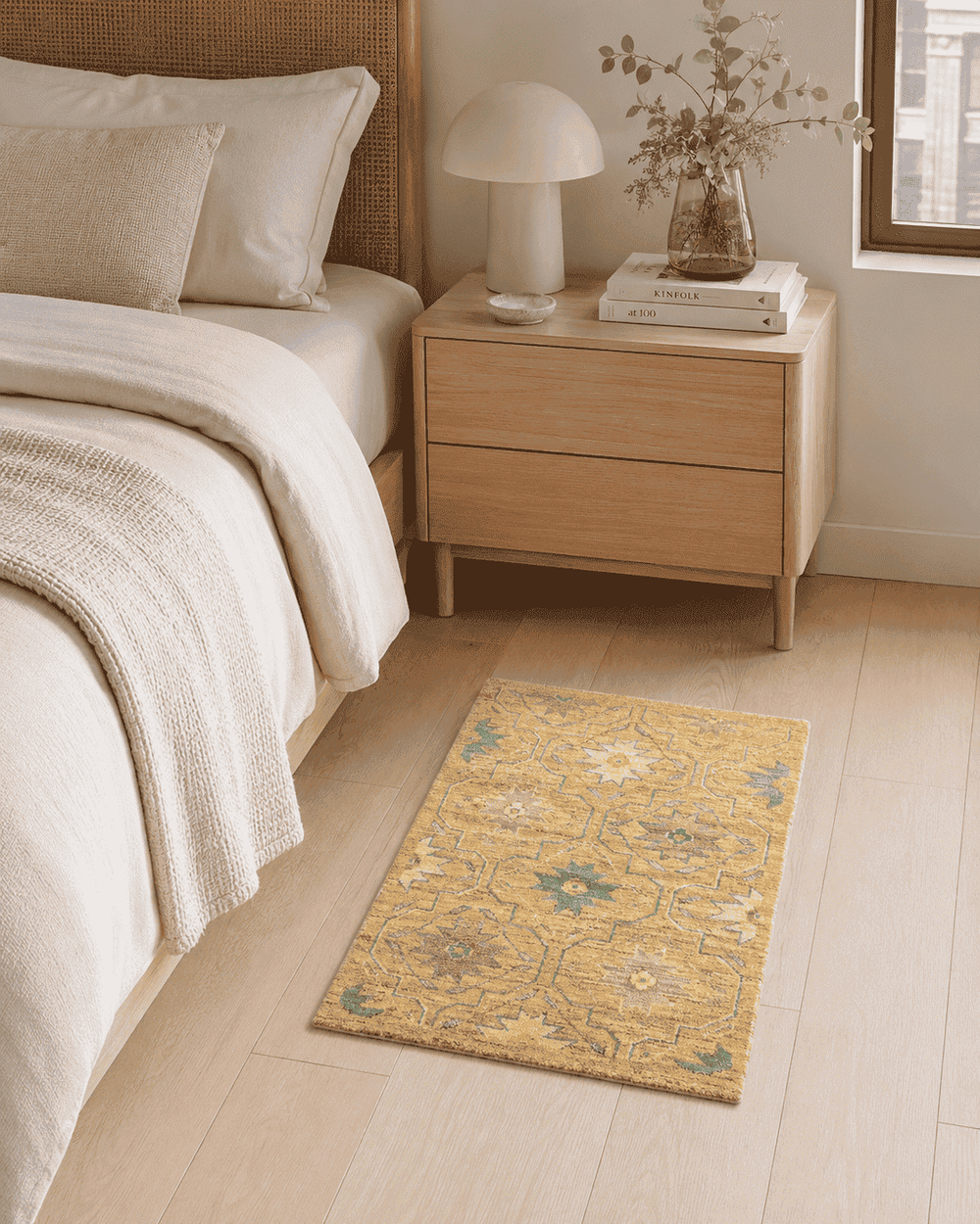 Floral design in gold and green on Afghan Gabbeh wool rug