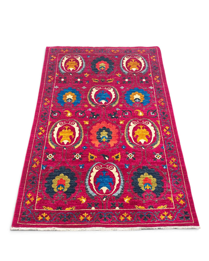 Border detail of magenta suzani hand-knotted Afghan Gabbeh rug