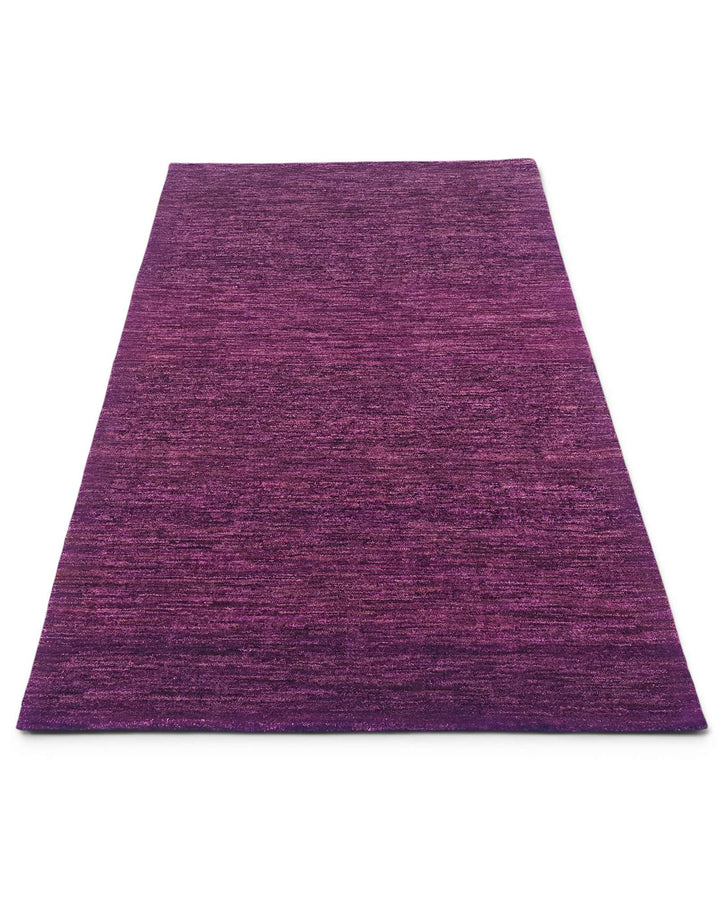 Hand-knotted wool pile of mulberry purple Gabbeh rug