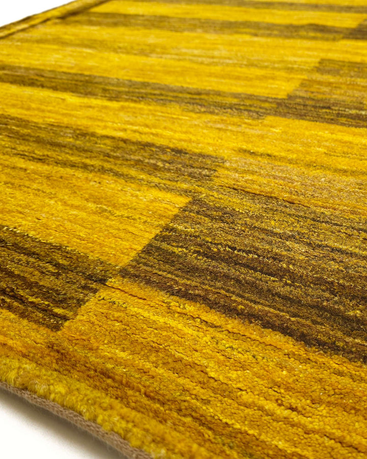 Border detail of mustard hand-knotted Afghan Gabbeh rug