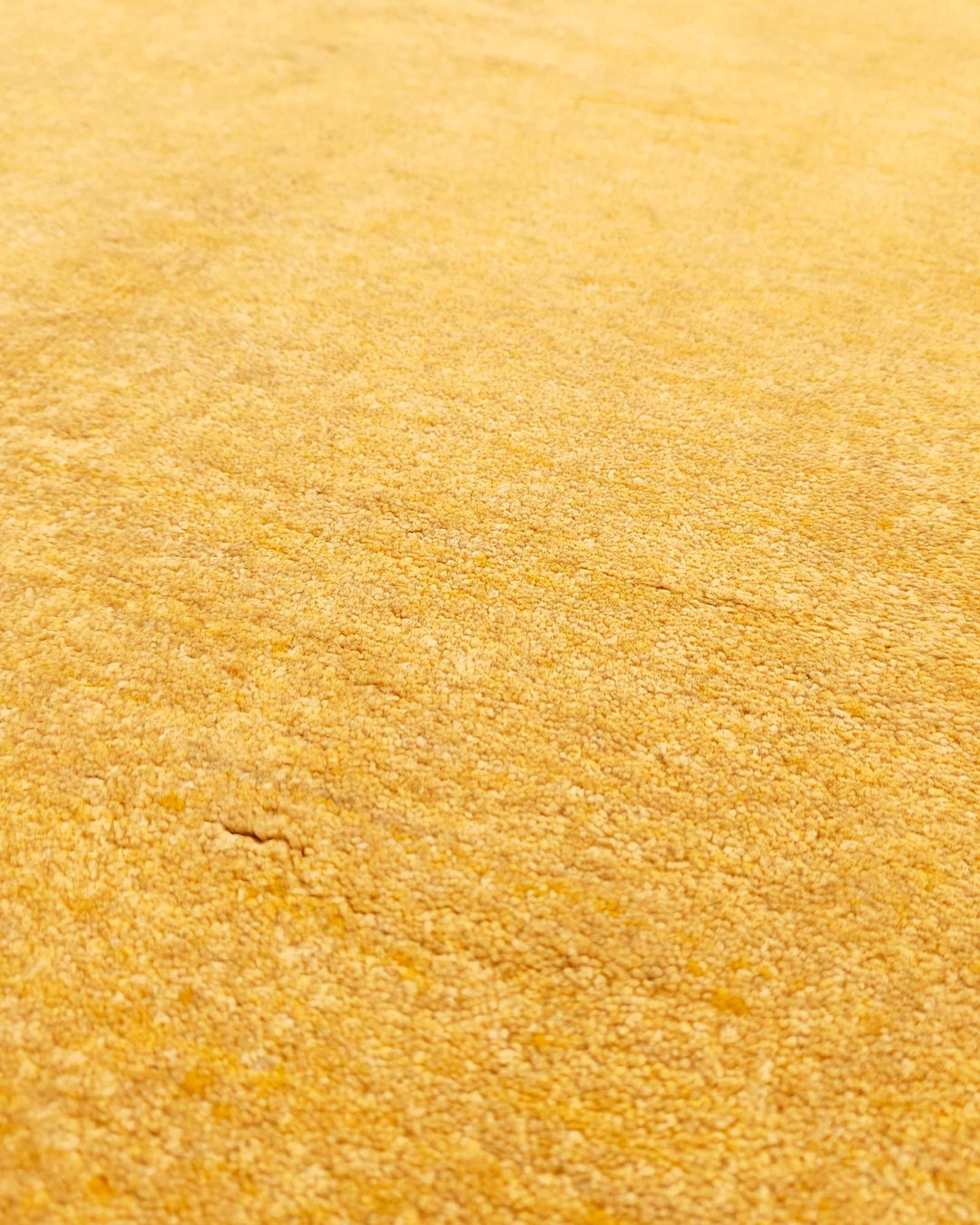 Hand-knotted Afghan Gabbeh rug in saffron gold wool