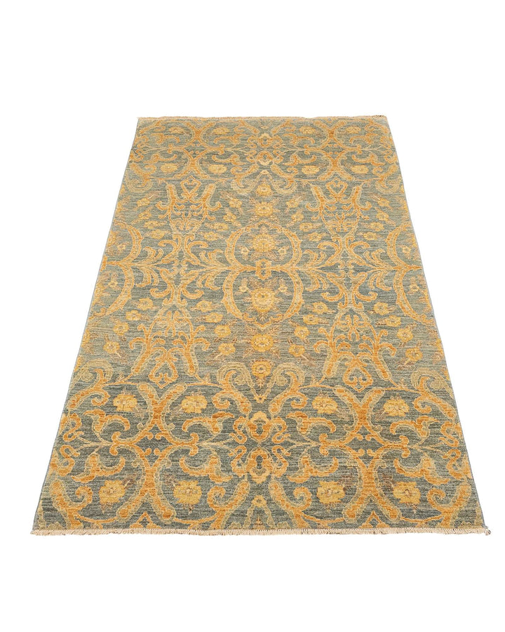 Corner of antique gold Afghan Gabbeh hand-knotted rug