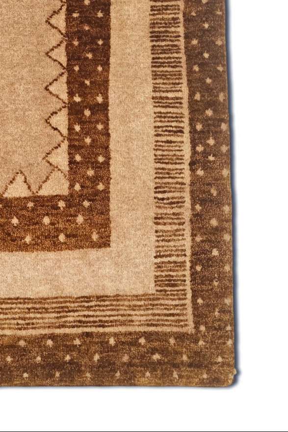 Hand-knotted wool pile of camel brown Gabbeh rug