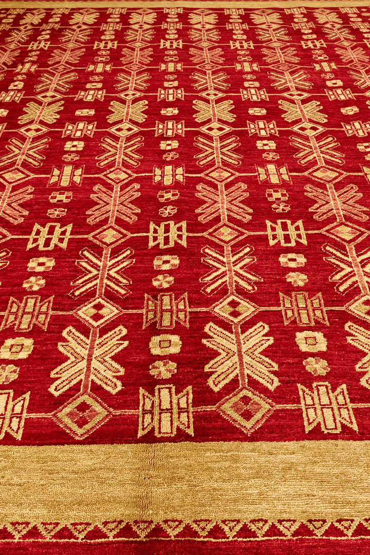 Hand-knotted bright red Ghazni rug with wheat gold lattice