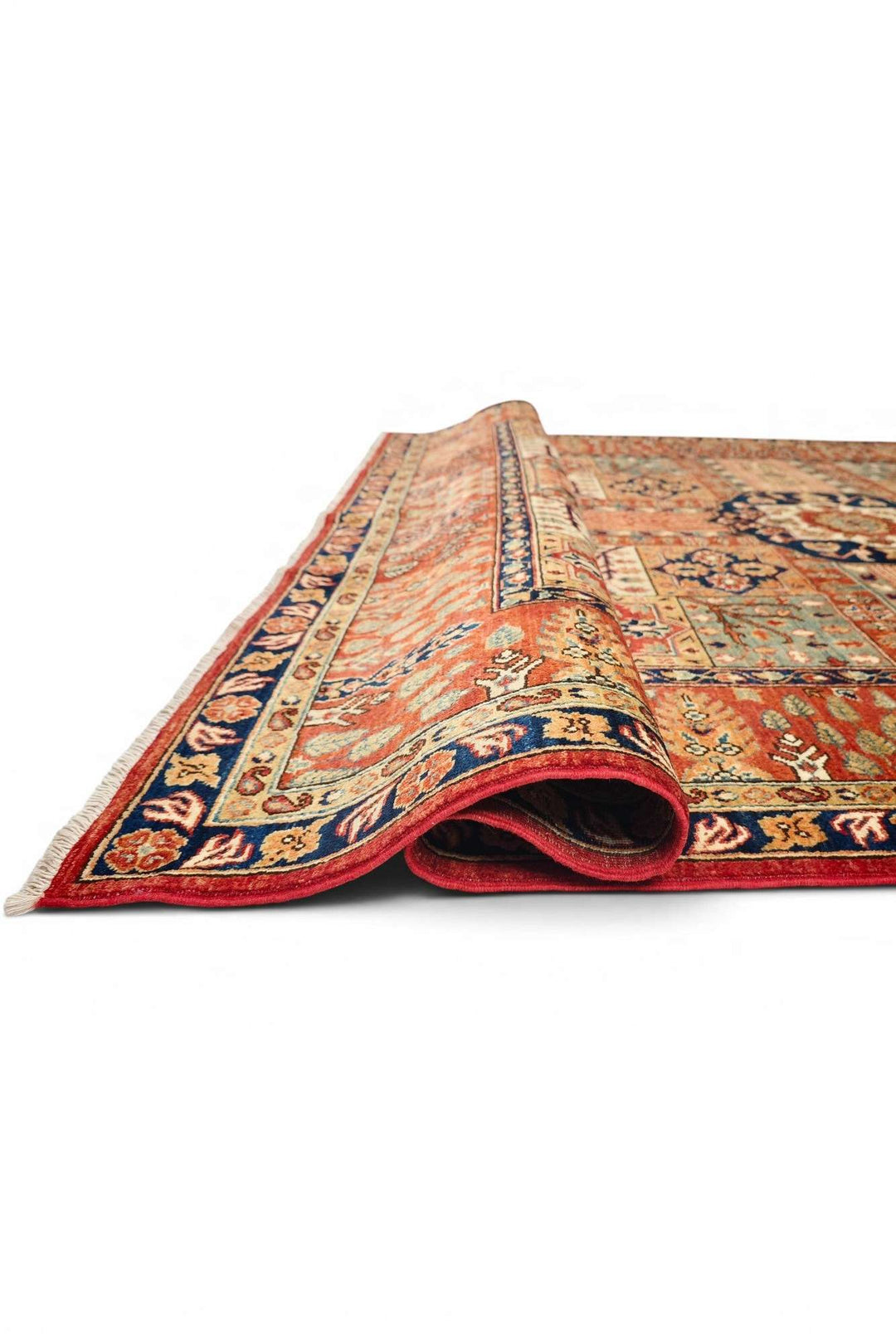 Corner of rust Bakhtiari panel Ghazni hand-knotted rug