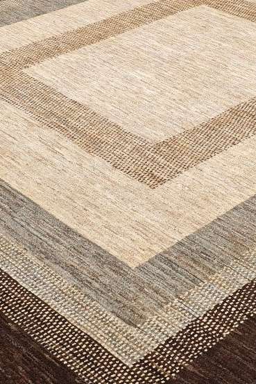 Modern field of hand-knotted cream Ghazni rug