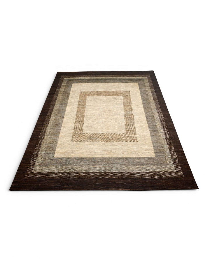 Hand-knotted wool pile of cream brown Ghazni rug