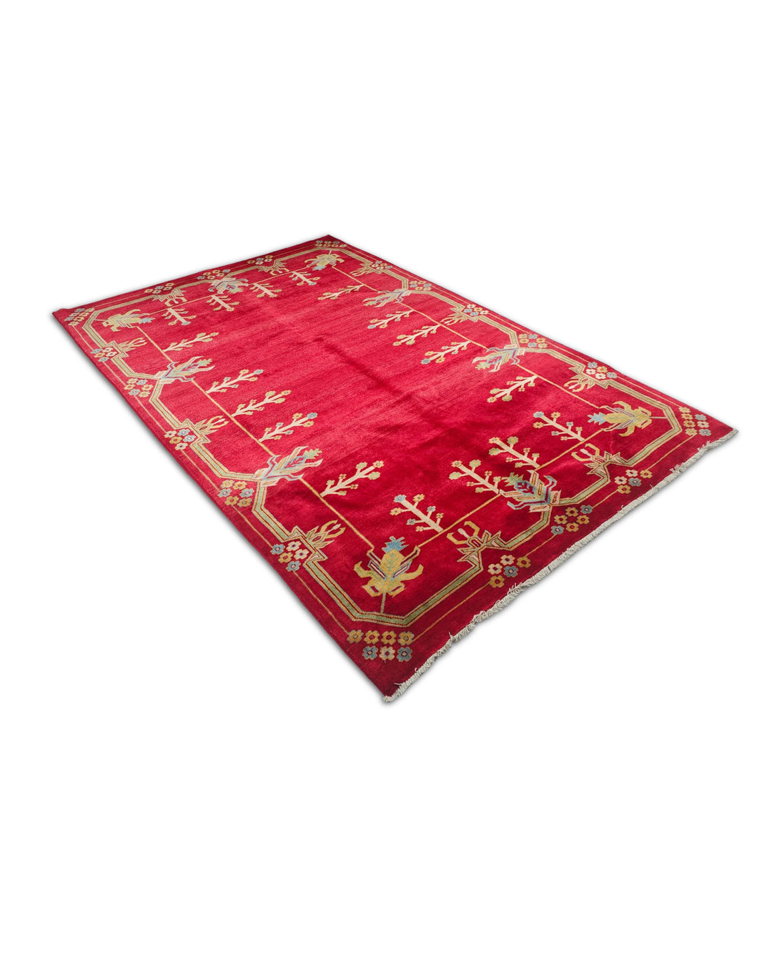 Hand-knotted deep red Ghazni rug with tree on open field