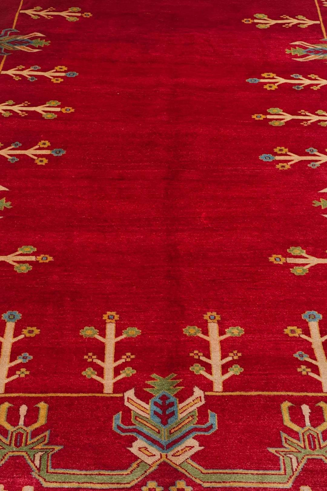 Corner of deep red flowering tree Ghazni hand-knotted rug