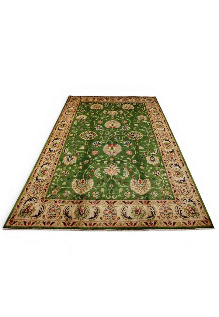 Border detail of green floral Ghazni hand-knotted rug