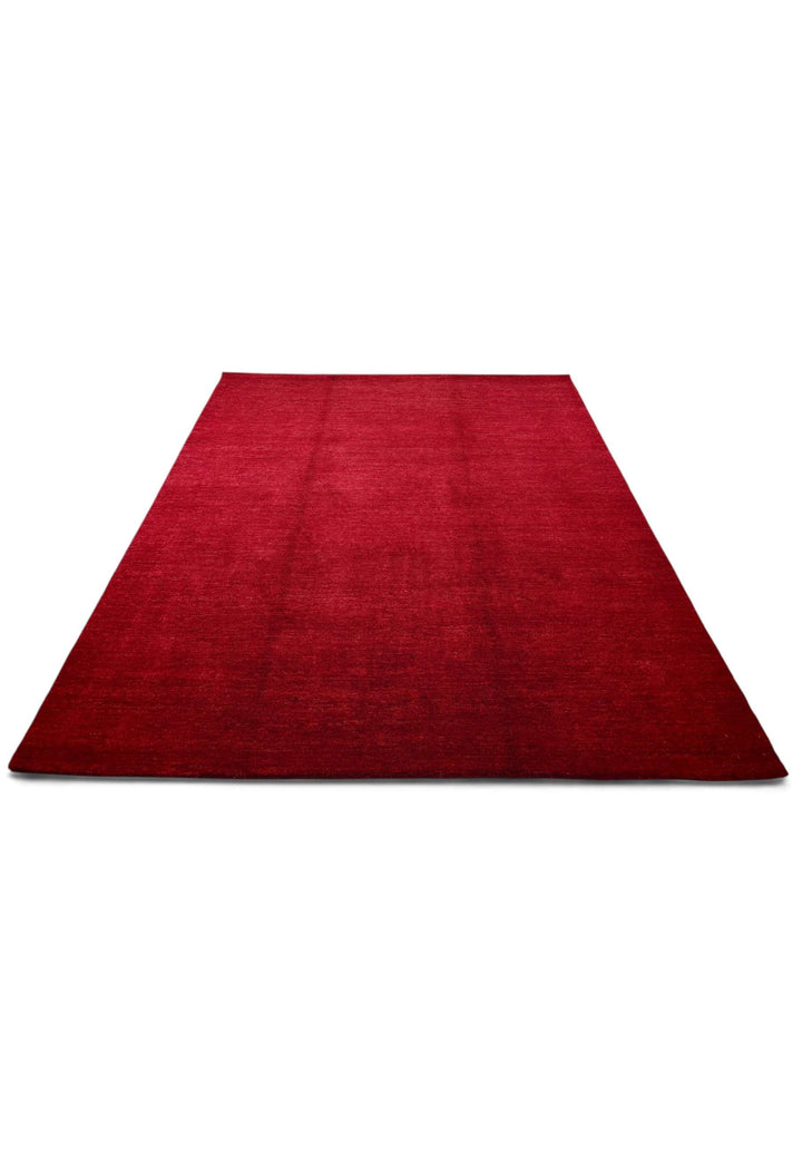 Hand-knotted wool pile of madder red Ghazni rug