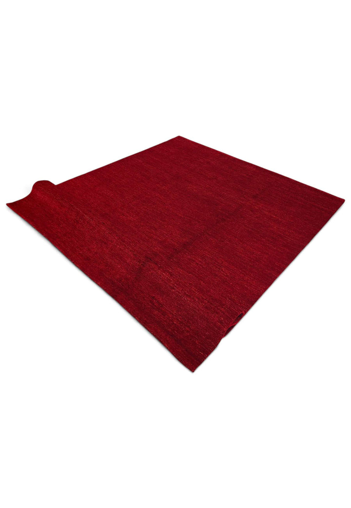 One-of-a-kind madder red plain Ghazni rug