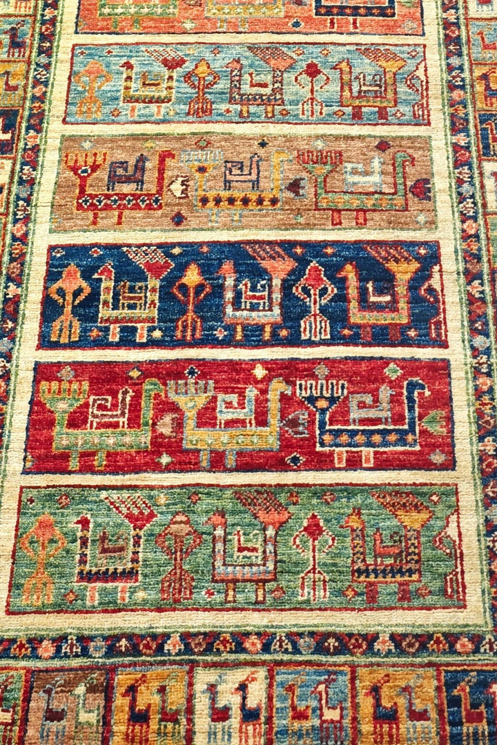 Hand-knotted Ghazni runner with tribal animal motif bands