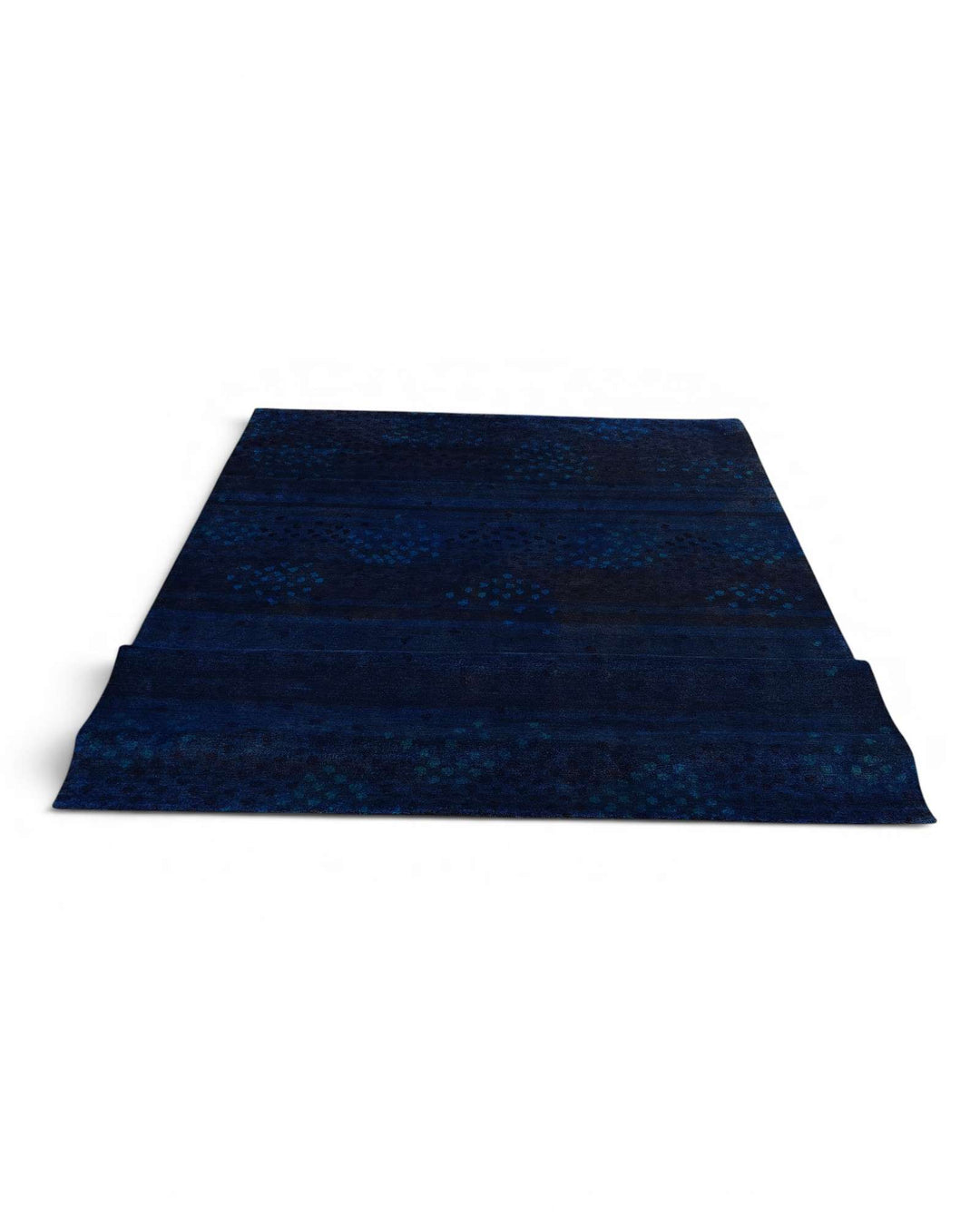 Hand-knotted midnight navy Ghazni rug with plain field