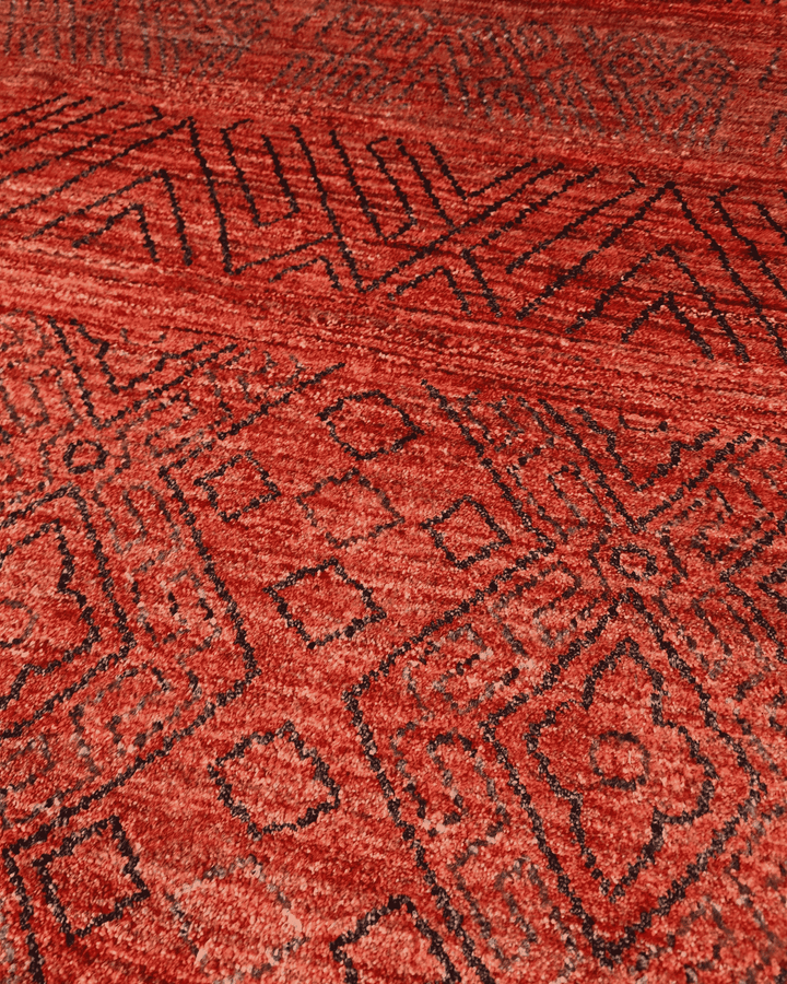 Hand-knotted Ghazni wool pile of red tribal geometric rug