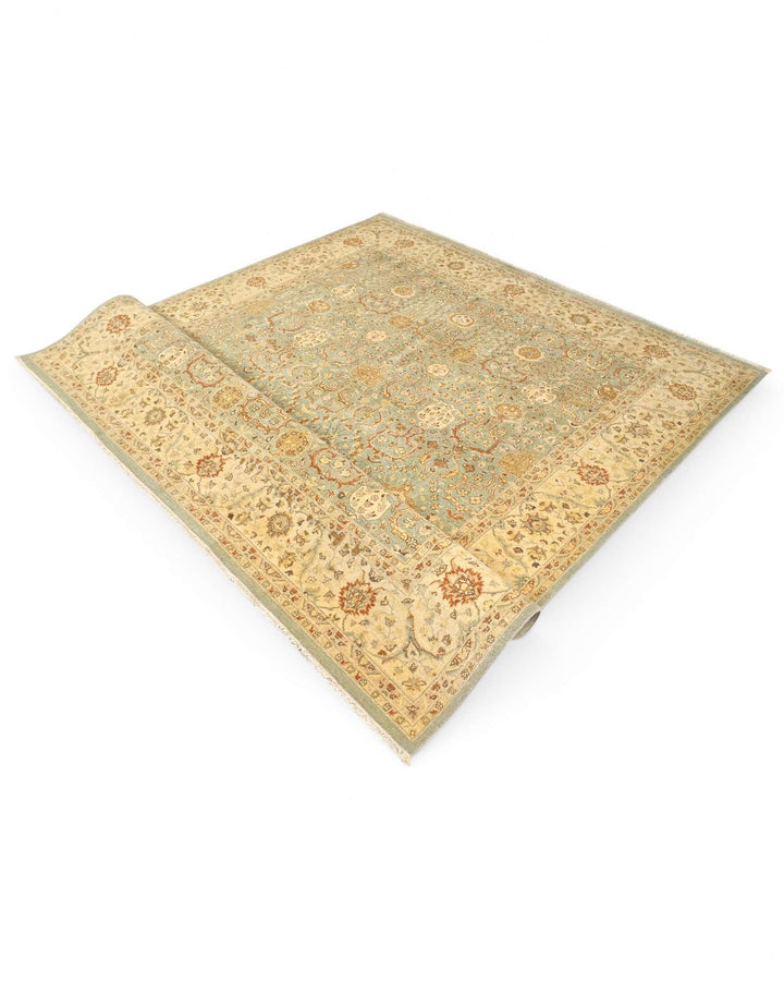 Hand-knotted pale sage Ghazni rug with gold floral field