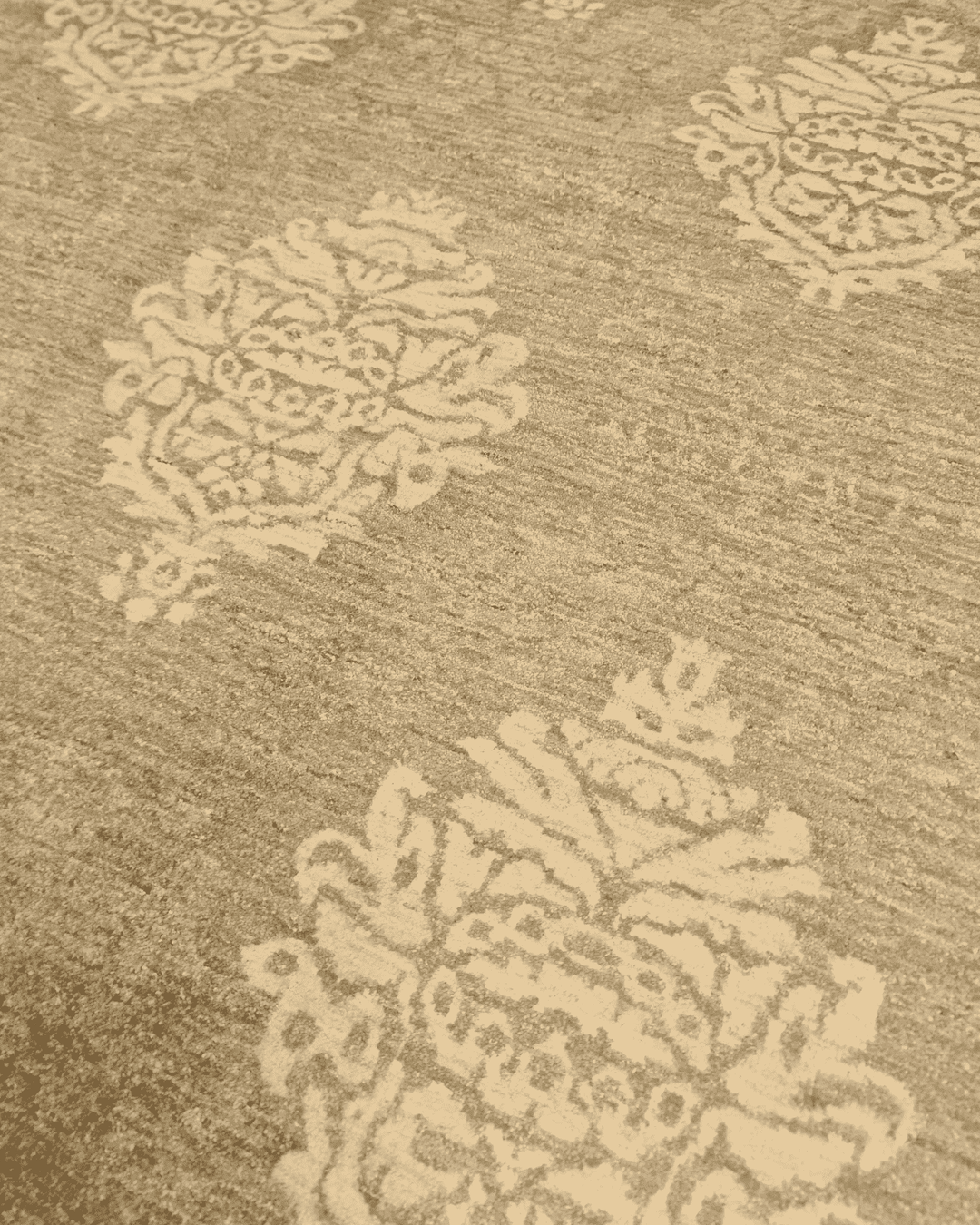 Border detail of sage cream damask Ghazni rug