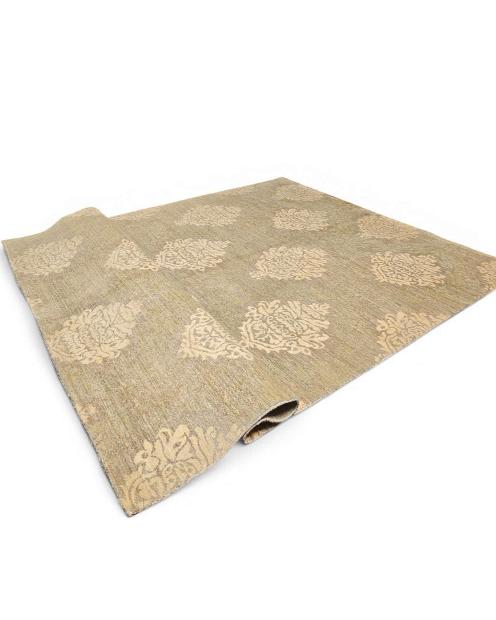 Hand-knotted sage Ghazni rug with cream damask field