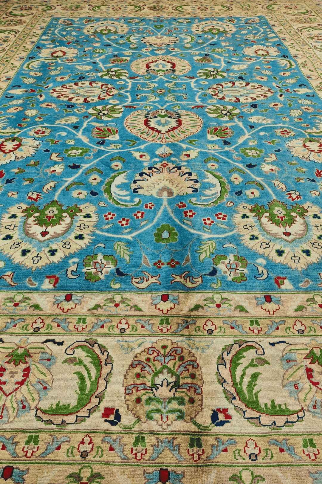 Hand-knotted turquoise Ghazni rug with Chobi floral field