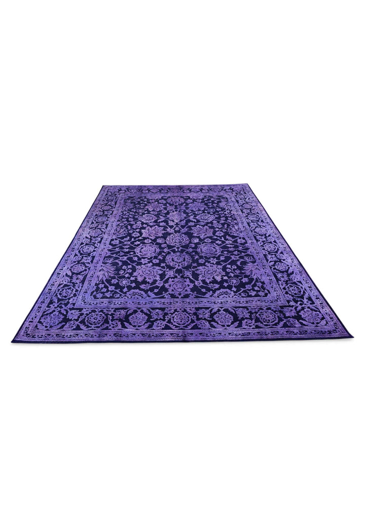Border detail of violet overdyed Ghazni hand-knotted rug