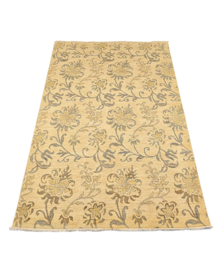 Border detail of champagne hand-knotted Afghan Gabbeh rug