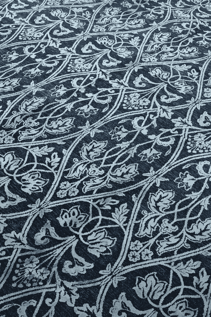 Trellis detail in indigo on Afghan Ghazni wool and silk rug