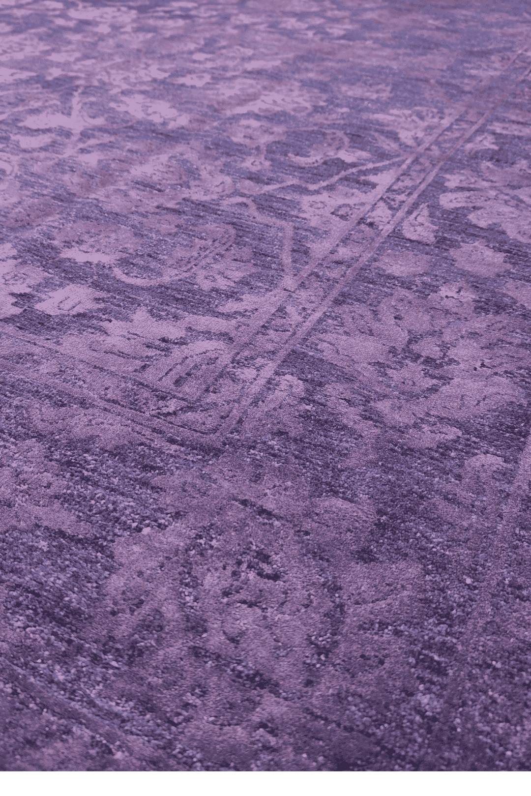 Border detail of purple floral Ghazni hand-knotted rug