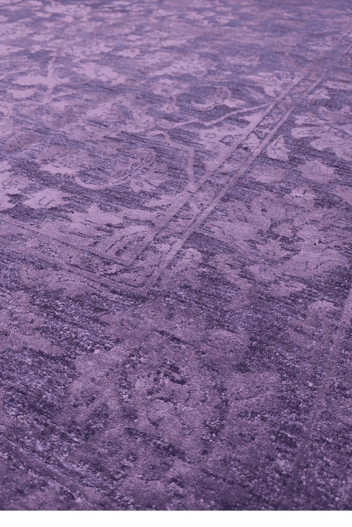 Border detail of purple floral Ghazni hand-knotted rug