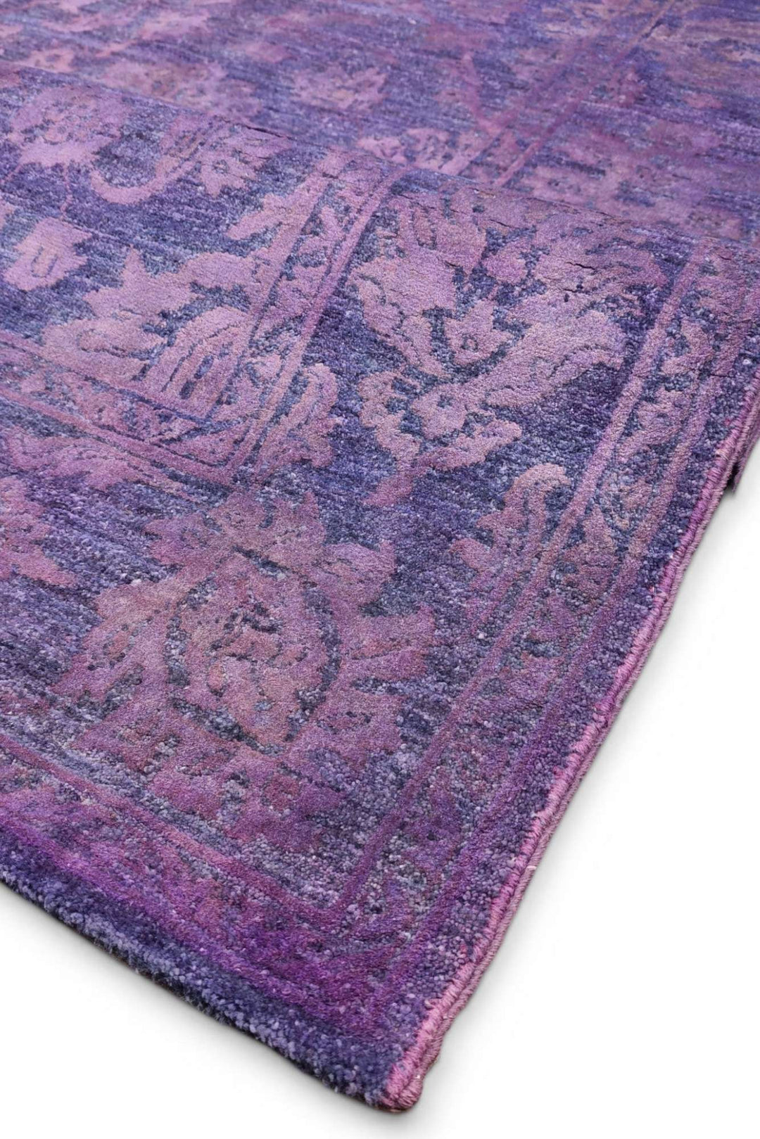 Hand-knotted purple Ghazni rug with silk floral field