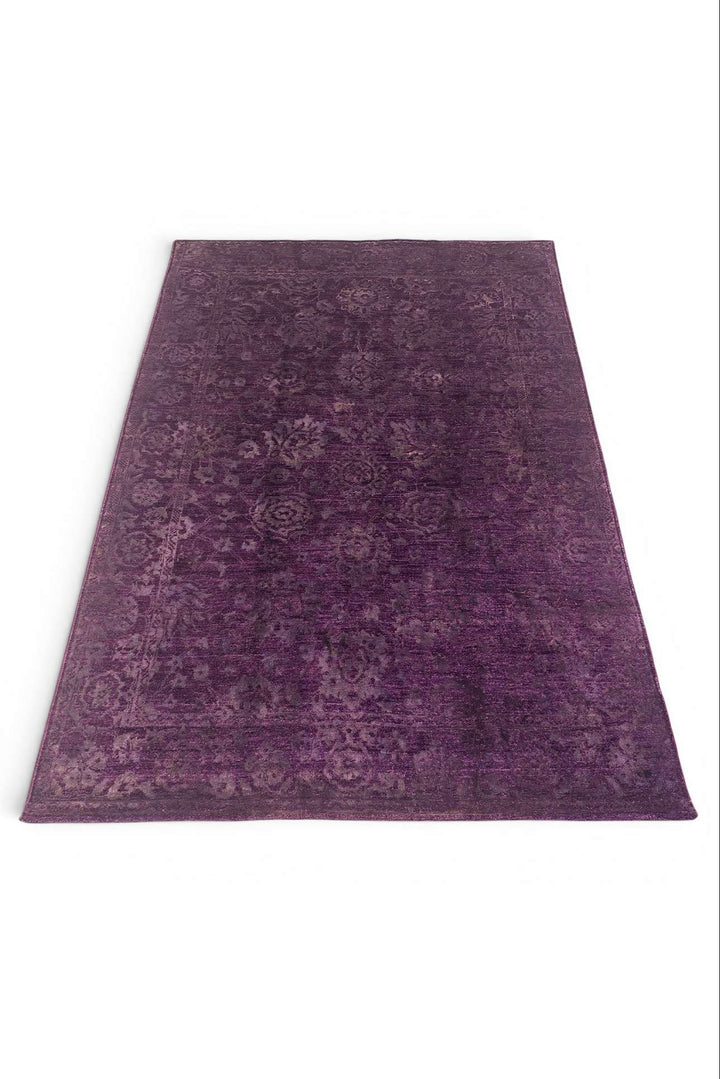Border detail of purple hand-knotted Afghan Gabbeh rug