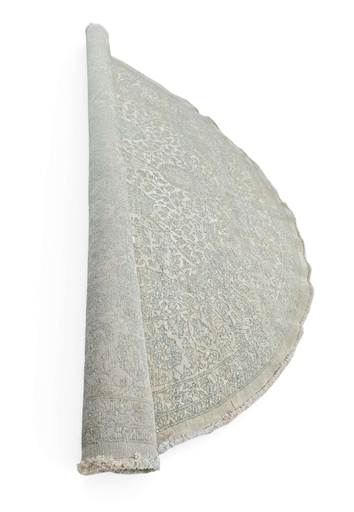 Hand-knotted round Ghazni rug with silk concentric floral